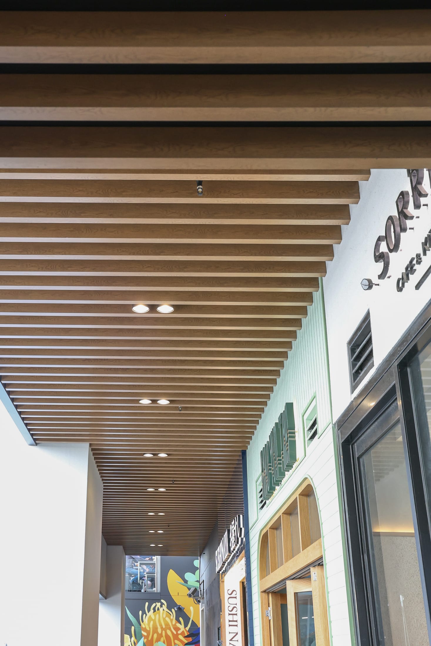 Redfern commercial timber-look batten facade — photo 1